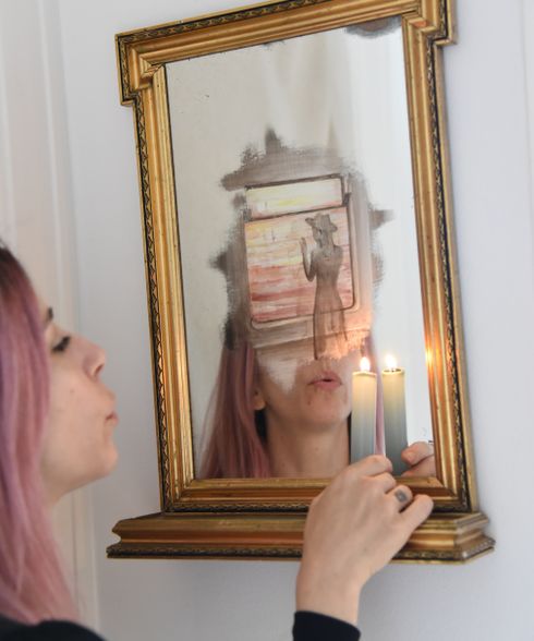 painting incorporated with mirror, gold frame