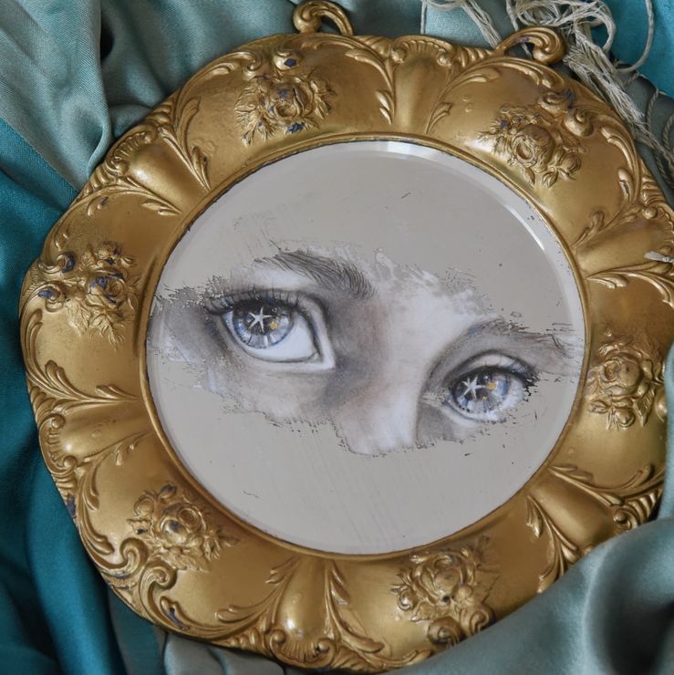painting incorporated with mirror in gold frame