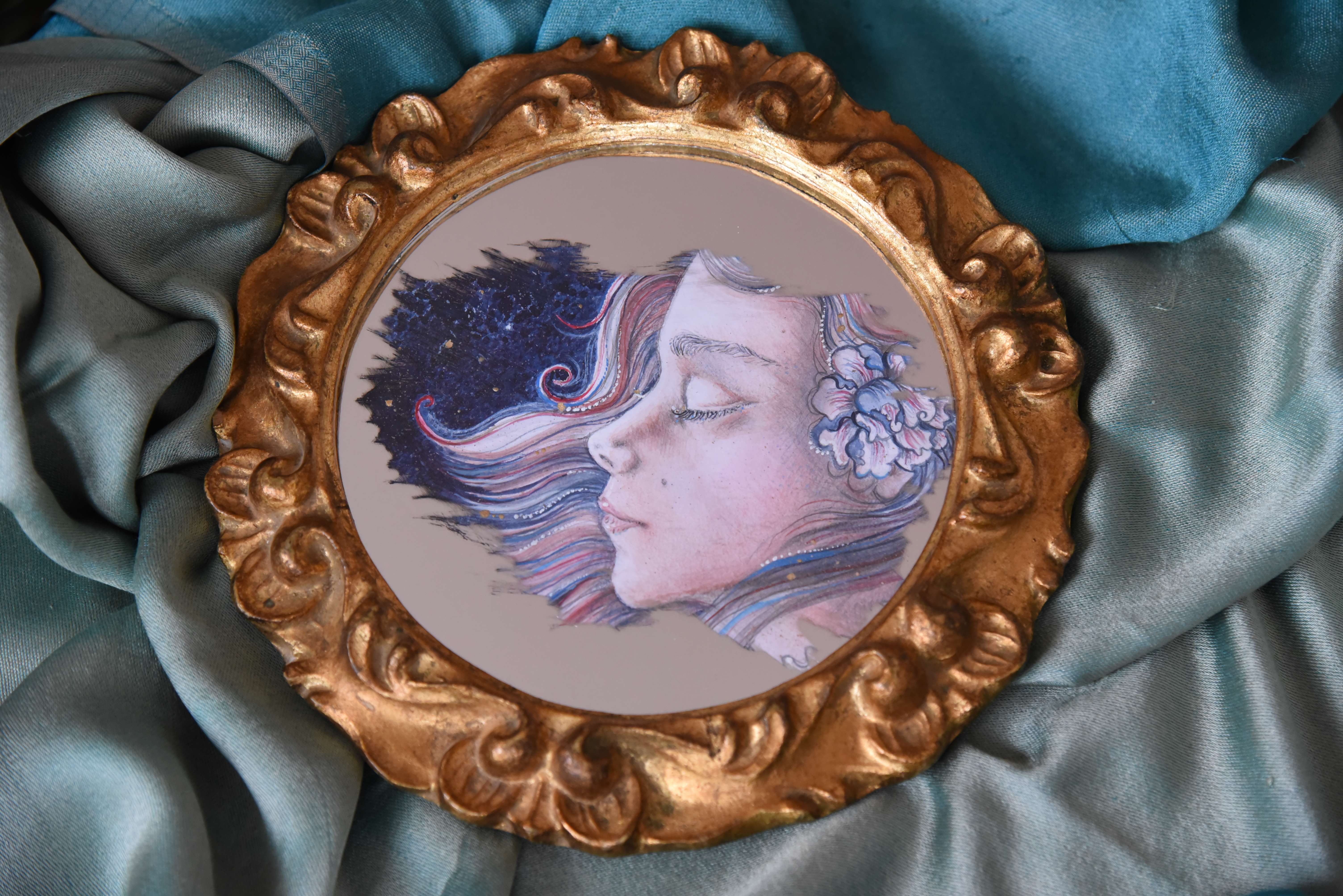 painting incorporated with mirror in gold frame